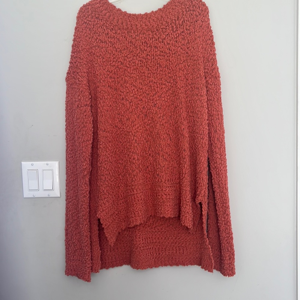 Loose knitted, burnt orange sweater